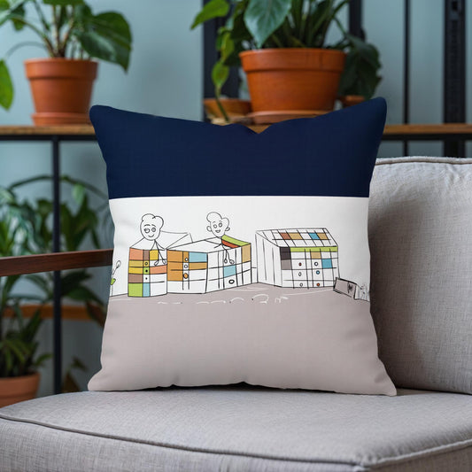 Decorative pillow with a colorful illustration on a gray couch