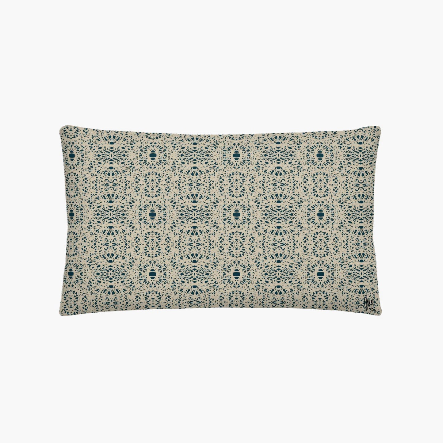 Decorative pillow with a blue and white pattern on a white background