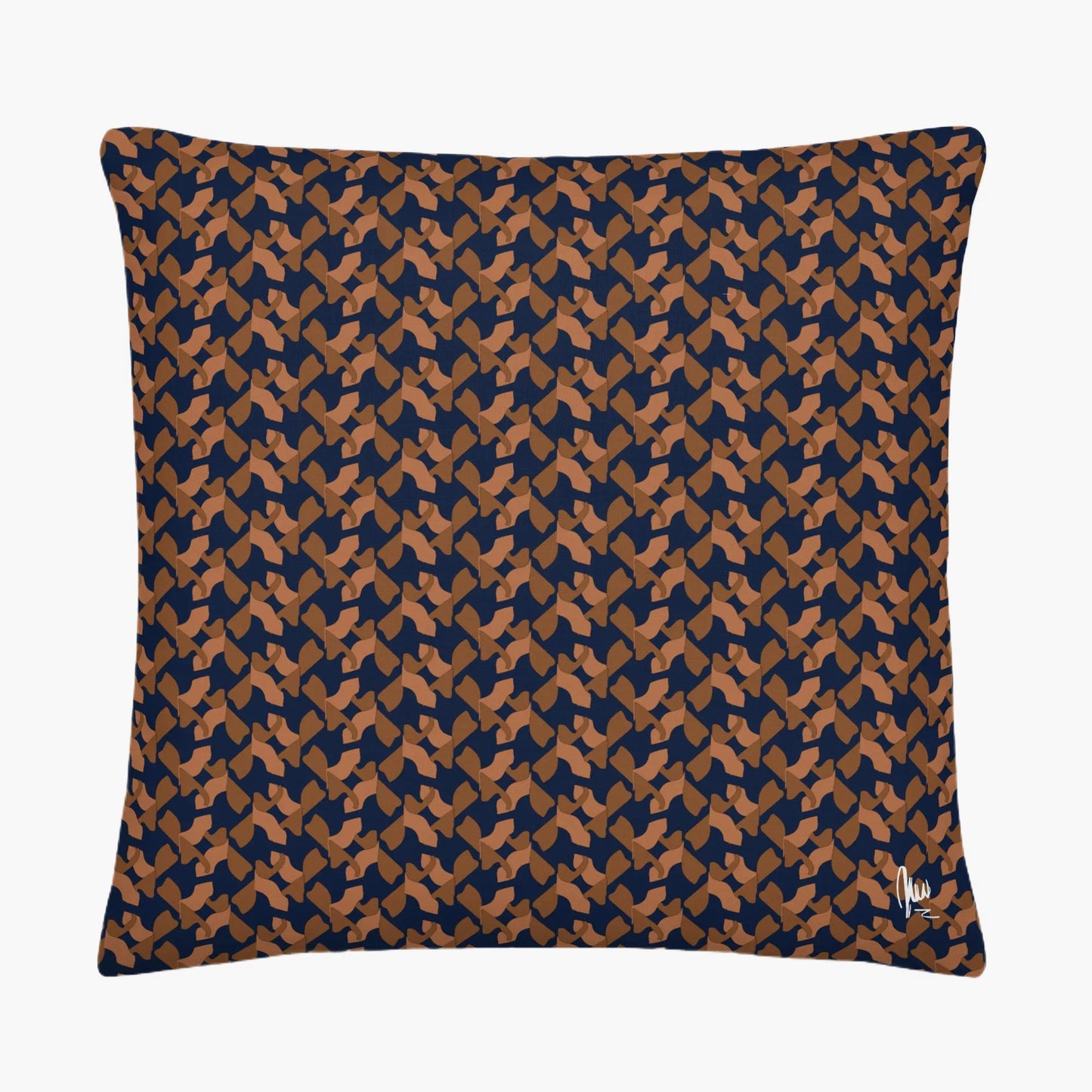 Patterned pillow with blue and brown design on a white background