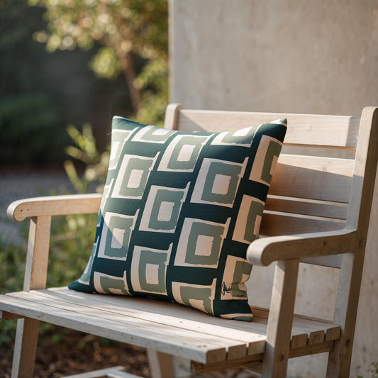 Green and beige patterned pillow on a wooden bench outdoors - by Northwind Illustrations