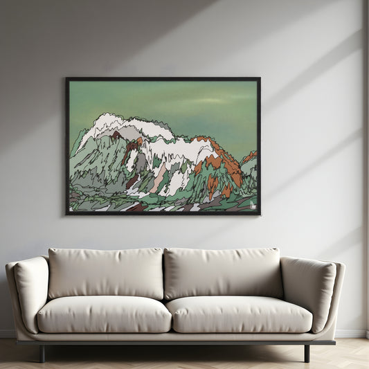 Framed mountain artwork above a beige sofa in a room with a gray wall.