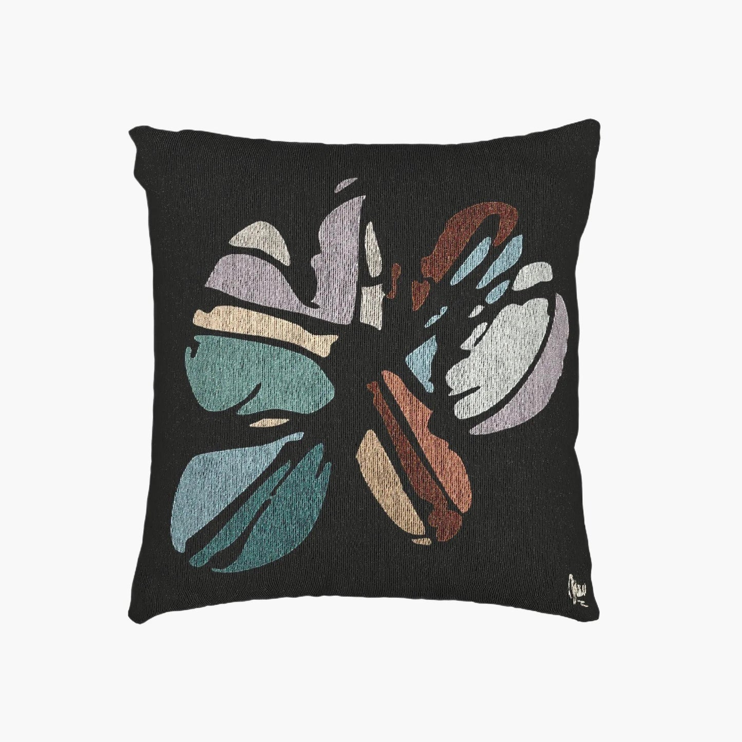 Decorative pillow with a butterfly design on a black background