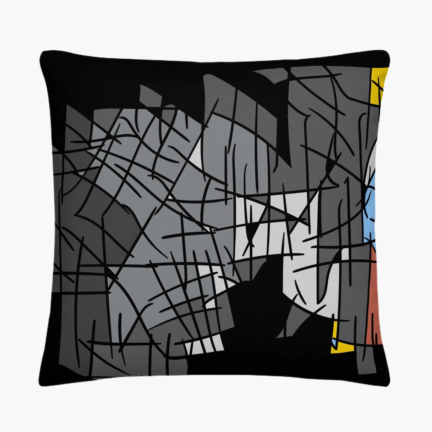 Abstract design pillow with black, gray, and yellow pattern on a white background
