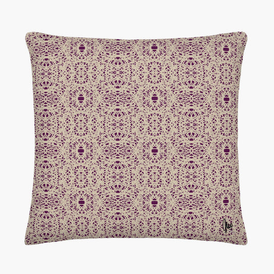 Decorative pillow with purple geometric pattern on beige background