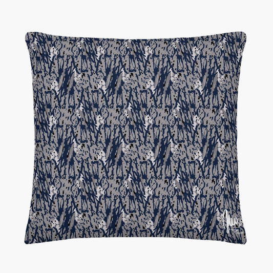 Decorative pillow with blue and gray abstract pattern on a white background