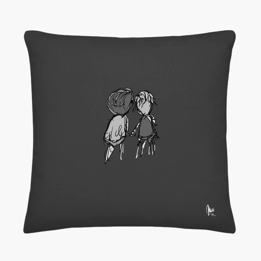 Black pillow with a black and white illustration of two people holding hands on a white background