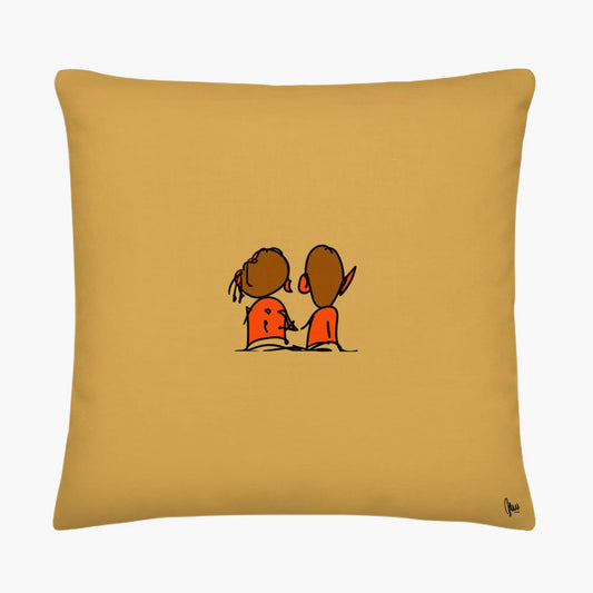 Yellow pillow with cartoon characters holding hands on a white background