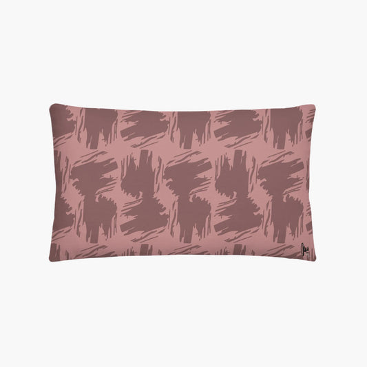 Pink pillow with abstract pattern on a white background