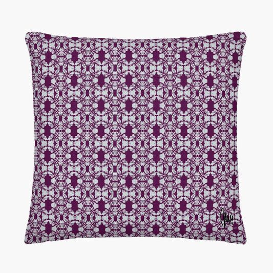 Decorative pillow with a purple geometric pattern on a white background
