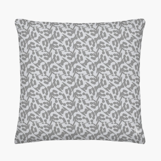Gray pillow with subtle pattern on a white background