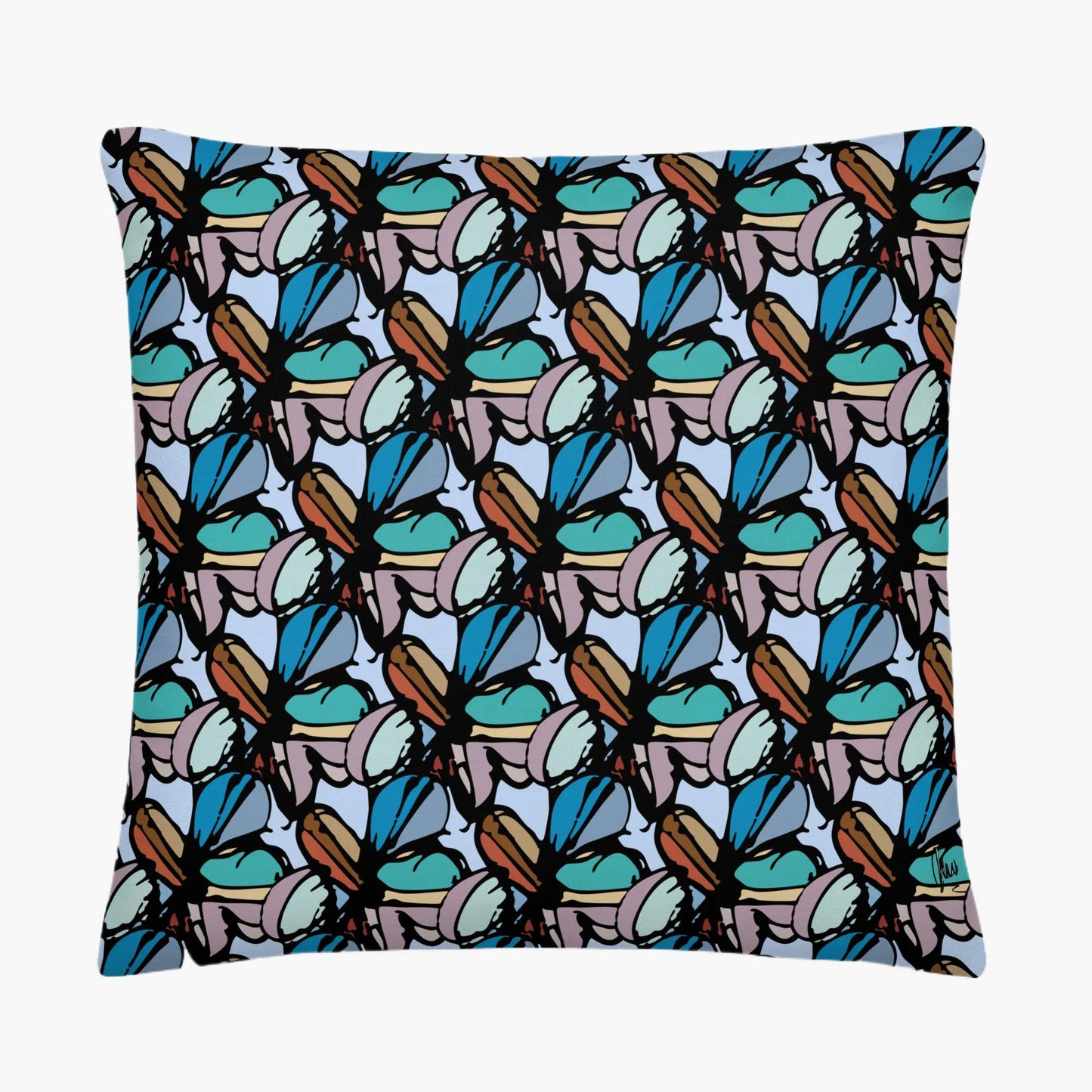 Pillow with a pattern of blue and brown shapes on a white background