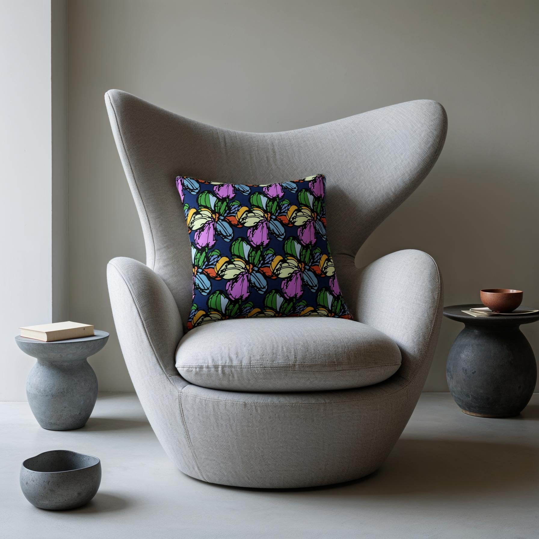 Modern chair with a colorful butterfly-patterned pillow in a minimalistic room - by Northwind Illustrations