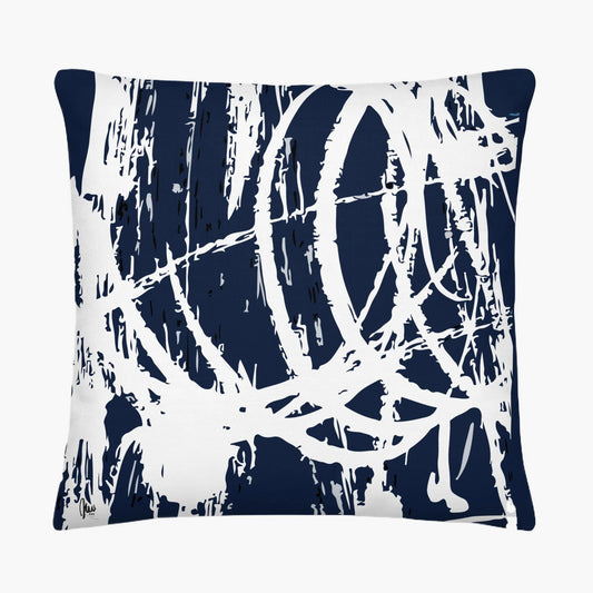 Navy and white abstract patterned pillow on a white background
